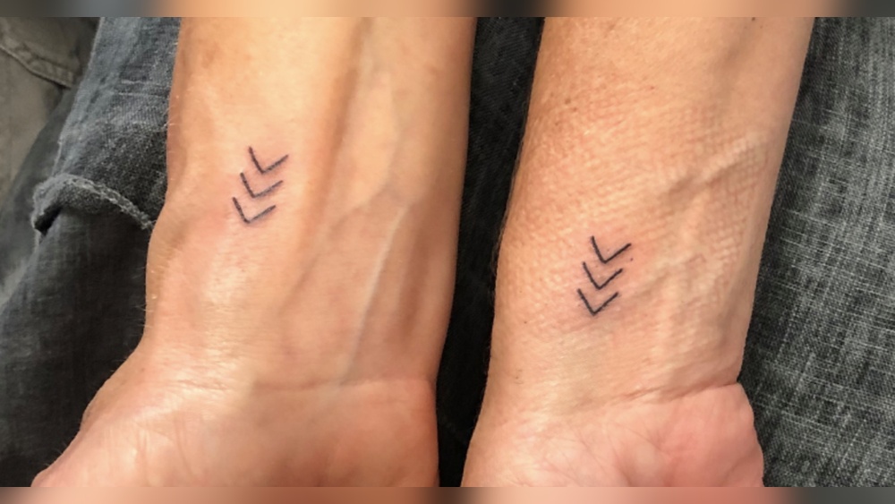 arrowhead tattoo meaning.jpg