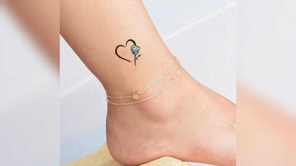 blue heart tattoo meaning.jpg