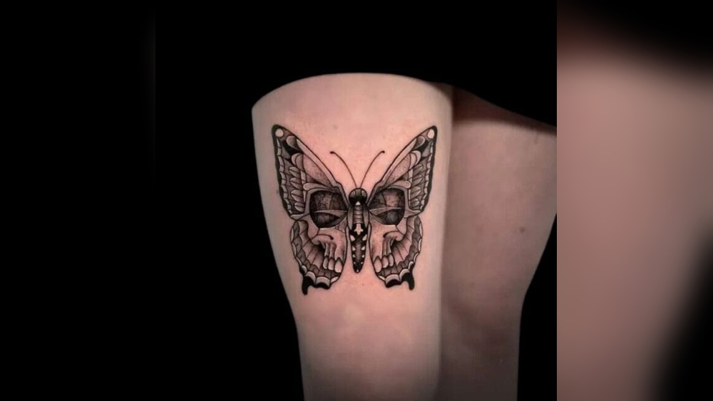 butterfly skull tattoo meaning.jpg