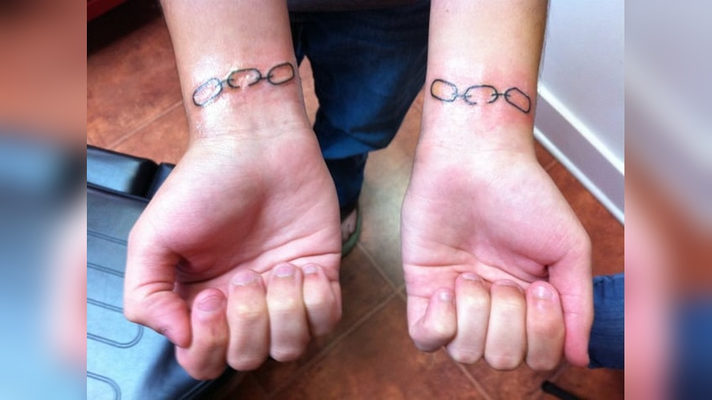 chain tattoo meaning.jpg