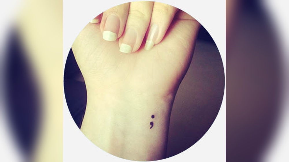 comma tattoo meaning.jpg