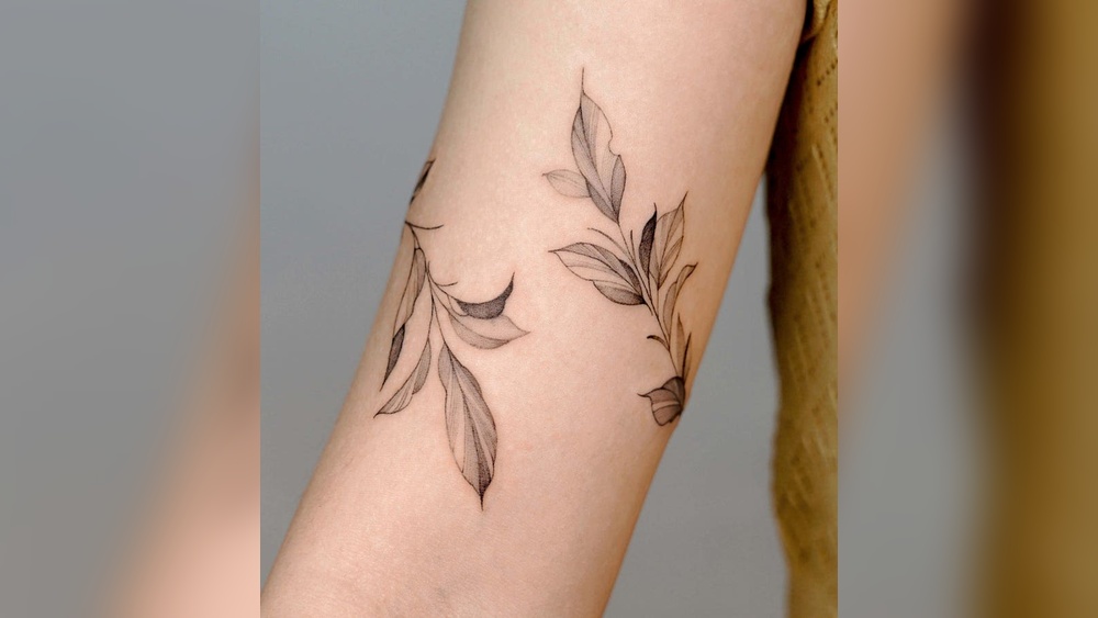 leaf tattoo meaning.jpg