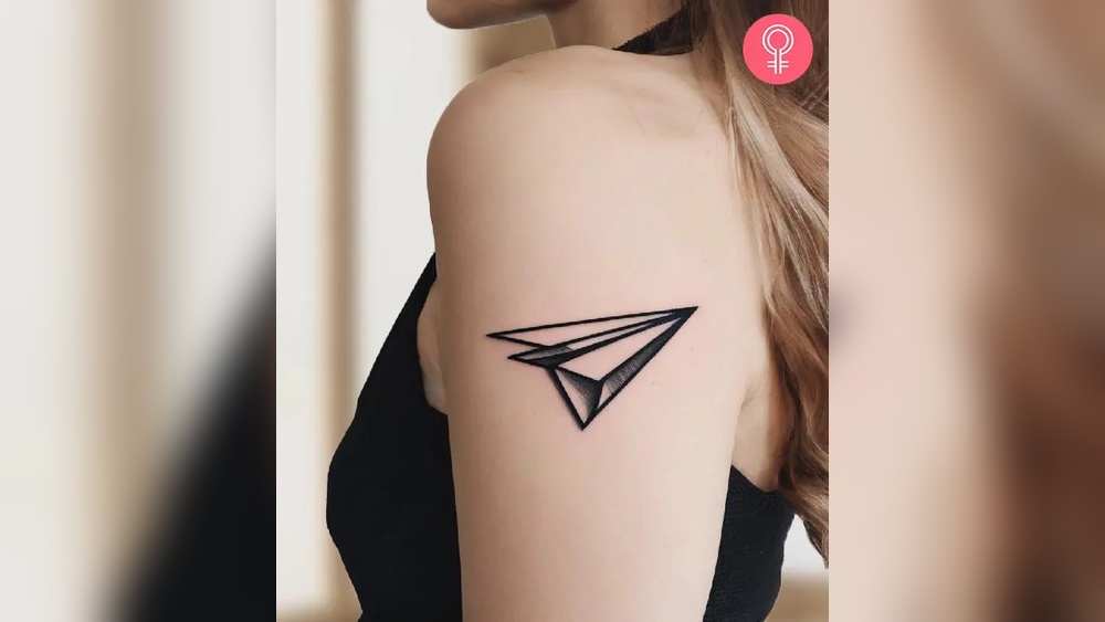 paper airplane tattoo meaning.jpg