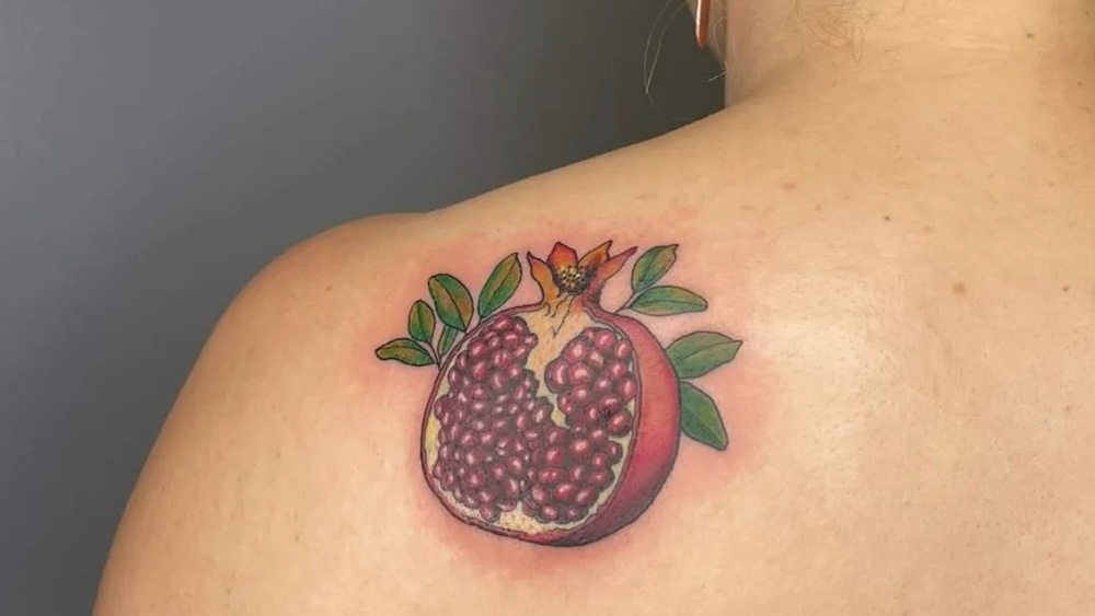 pomegranate tattoo meaning.jpg