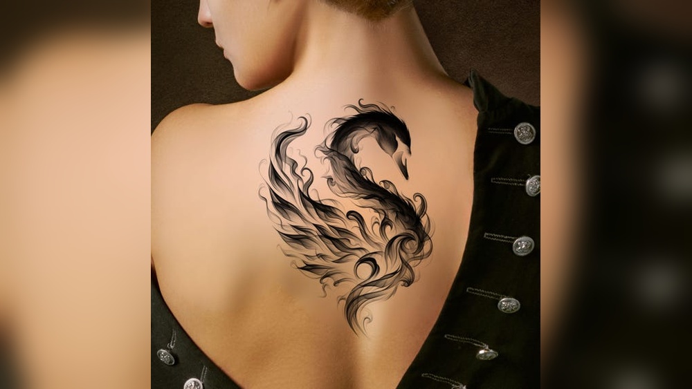 swan tattoo meaning.jpg