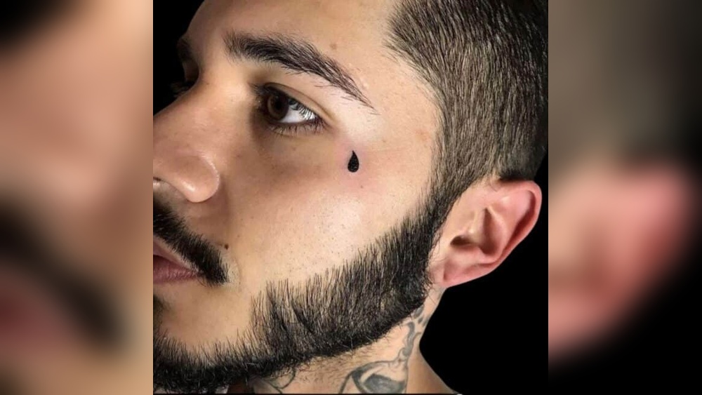 tear drop tattoo meaning left eye.jpg