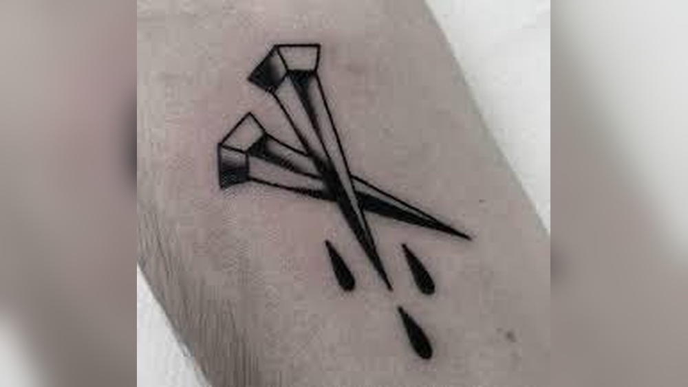 traditional nail tattoo meaning jpg