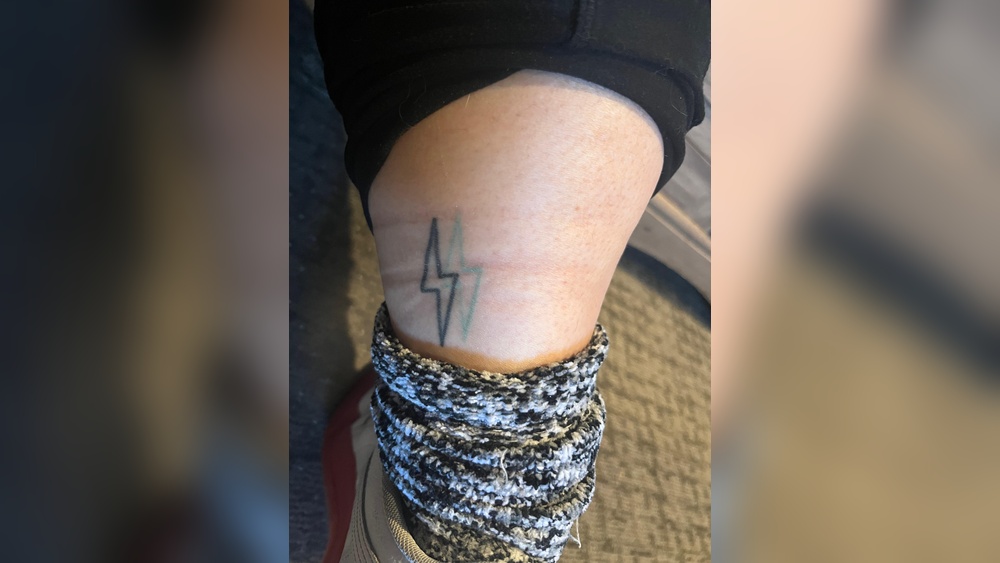 two lightning bolts tattoo meaning.jpg